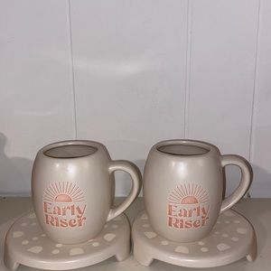 Two coffee cups or tea cup and treat.